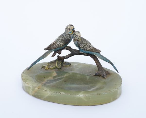 A COLD PAINTED BRONZE BUDGERIGAR AND ONYX PEN STAND