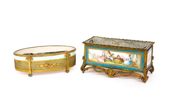 A FRENCH GILT-METAL AND SEVRES-STYLE PORCELAIN RECTANGULAR JARDINIERE AND ANOTHER OVAL JARDINIERE (2)