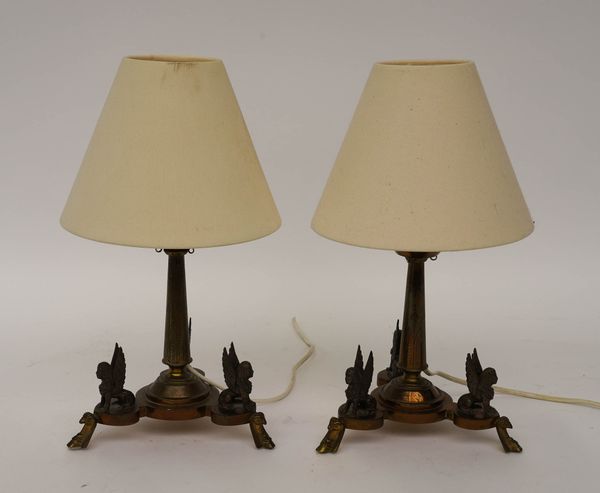 A PAIR OF FRENCH EGYPTIAN REVIVAL GILT-BRASS AND SILVERED METAL SPHINX TABLE LAMPS (2)