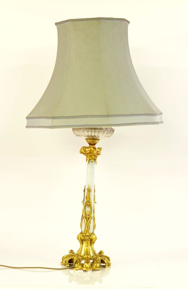 A VICTORIAN ROCOCO REVIVAL GILT-BRONZE MOUNTED BLUE OPALINE GLASS TABLE LAMP