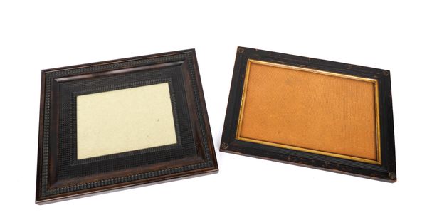 A PAIR OF EBONISED REEDED FRAMES AND TWO OTHERS (4)