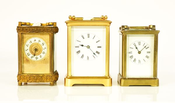 THREE BRASS CORNICHE CARRIAGE CLOCKS (3)