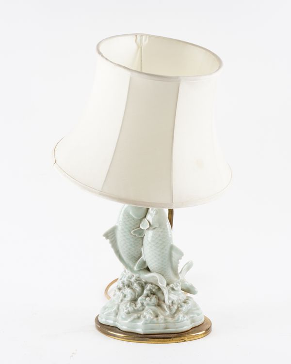 A CELADON PORCELAIN FISH LAMP AND SHADE