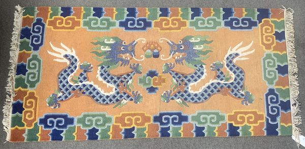 A MODERN CHINESE DRAGON RUG