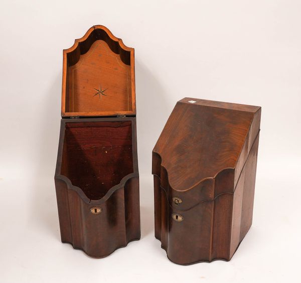 A PAIR OF GEORGE III MAHOGANY SLOPE TOP SERPENTINE FRONTED KNIFE BOXES (2)