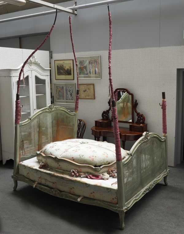 A 19TH CENTURY FRENCH FLORAL CARVED POLYCHROME PAINTED FOUR POSTER BED OR LIT A LA POLANISE