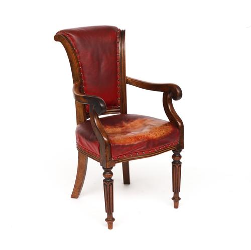 AN EARLY VICTORIAN MAHOGANY FRAMED OPEN ARM DESK CHAIR