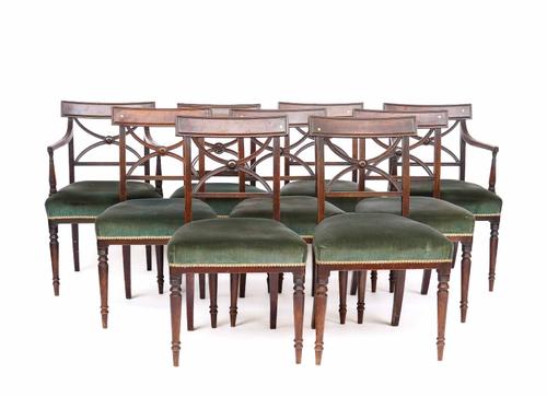 A SET OF NINE REGENCY MAHOGANY X-FRAME BACK DINING CHAIRS (9)