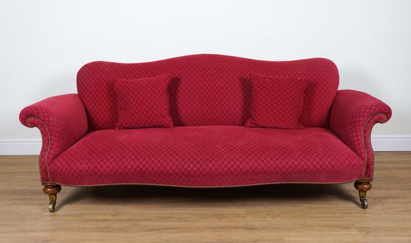 A LATE VICTORIAN BURGUNDY UPHOLSTERED SOFA