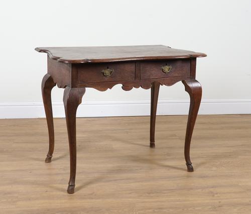 AN 18TH CENTURY DUTCH OAK SHAPED TOP SINGLE DRAWER TABLE