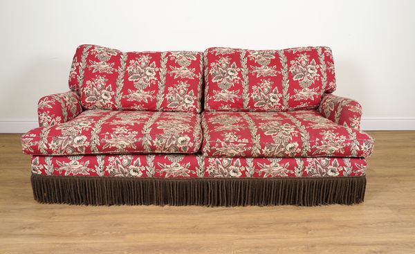 A THREE SEAT SOFA