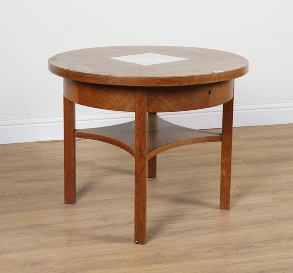 A MID 20TH CENTURY OAK CIRCULAR OCCASIONAL TABLE