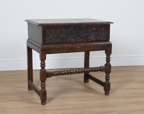 A 17TH CENTURY CARVED OAK BIBLE BOX