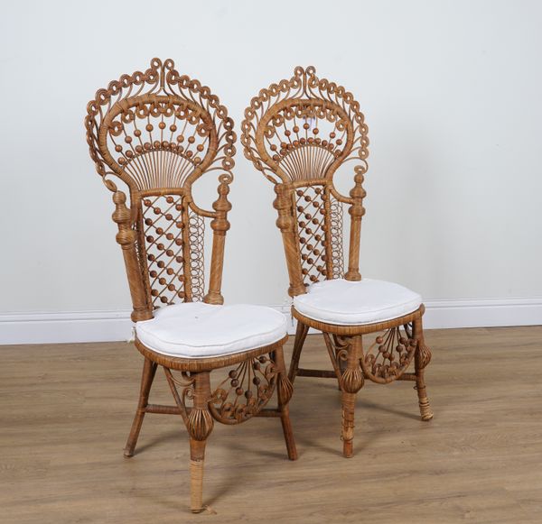 A PAIR OF MID 20TH CENTURY WOVEN RATTAN PEACOCK BACK CHAIRS (2)