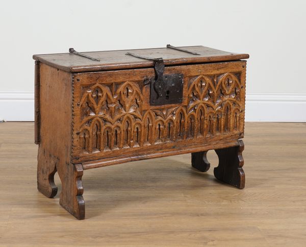 A 19TH CENTURY OAK GOTHIC REVIVAL FIVE PLANK COFFER