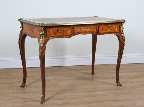 A LOUIS XV STYLE GILT METAL MOUNTED TULIP WOOD, KING WOOD, WALNUT AND ROSEWOOD BUREAU PLAT