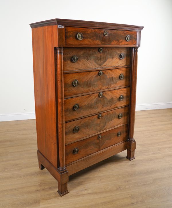 A LATE EMPIRE GILT METAL MOUNTED MAHOGANY TALL SEVEN DRAWER CHEST