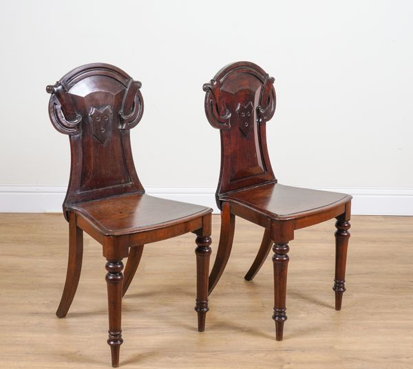 A PAIR OF VICTORIAN MAHOGANY HALL CHAIRS (2)