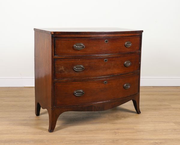 A REGENCY MAHOGANY BOW-FRONT THREE DRAWER CHEST