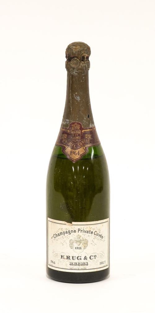 A BOTTLE OF KRUG CHAMPAGNE PRIVATE CUVEE 1964
