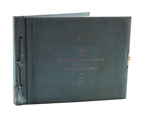 THE LAST SHAH OF IRAN (1919-80). "Visit of the Minister of the Chairman of Bulgaria Stanko Todorov in Iran 1972", photograph album, oblong 4to, one photograph signed by the Shah, pale blue buckram.