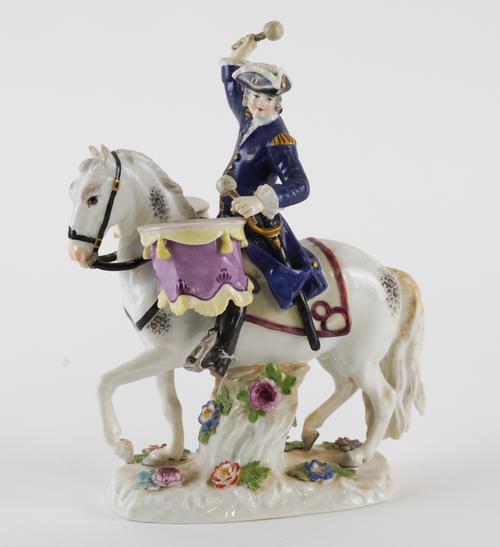 A MEISSEN FIGURE OF A SOLDIER DRUMMER ON HORSEBACK