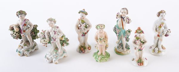 SEVEN BOW AND DERBY FIGURES OF PUTTI (7)