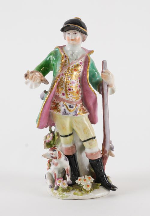 A BOW FIGURE OF A SPORTSMAN