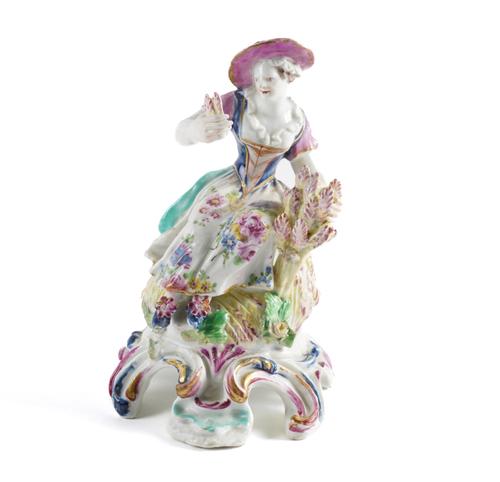 A BOW FIGURE OF SUMMER FROM THE RUSTIC SEASONS