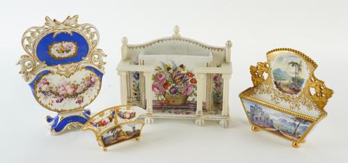 A GROUP OF FOUR ENGLISH PORCELAIN LETTER OR NOTE RACKS (4)