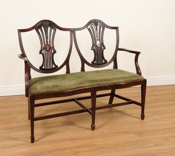 A MAHOGANY HEPPLEWHITE STYLE TWIN SEAT SHIELD BACK SETTEE