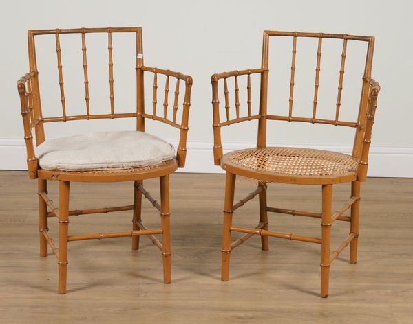 A PAIR OF LATE 19TH CENTURY POLYCHROME PAINTED FAUX BAMBOO OPEN ARMCHAIRS (2)