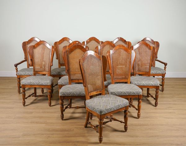 A SET OF TEN HARDWOOD FRAMED WING AND CANED ARCH BACK DINING CHAIRS (10)