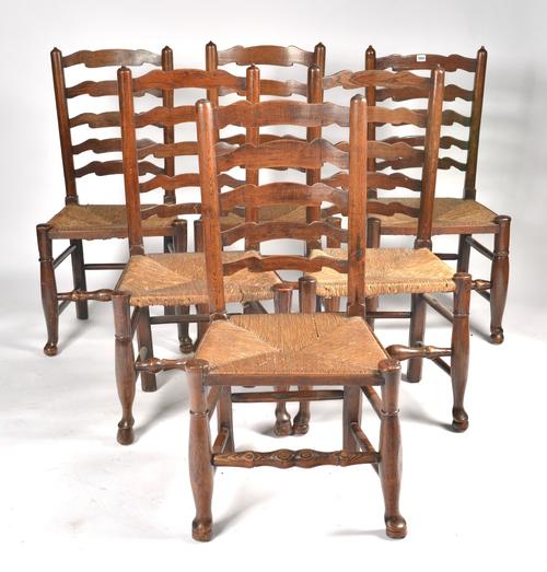 A MATCHED SET OF SIX GEORGE III ASH LADDER BACK DINING CHAIRS (6)