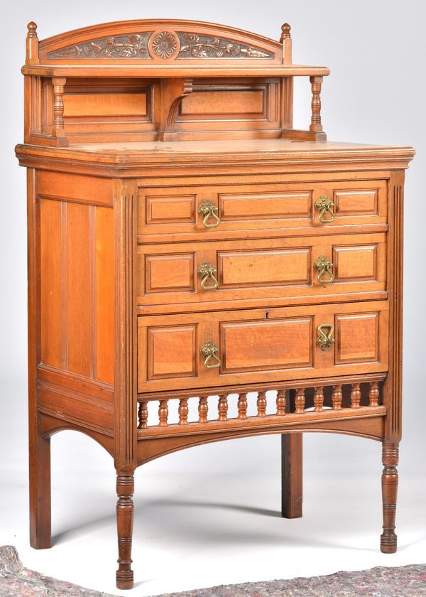 A LATE VICTORIAN ARTS AND CRAFTS WALNUT AND SATINWOOD SIDE CABINET