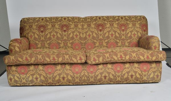 A MODERN THREE SEAT SOFA