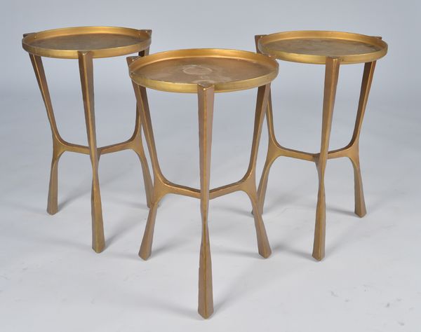 A SET OF THREE GOLD PAINTED METAL CIRCULAR OCCASIONAL TABLES (3)