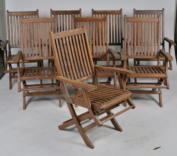 WESTMINSTER TEAK; A SET OF EIGHT FOLDING HARDWOOD GARDEN CHAIRS (8)