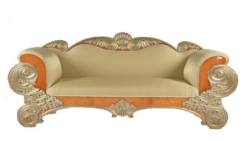 AN EARLY 19TH CENTURY BIEDERMEIER PARCEL GILT AND CHERRY SOFA