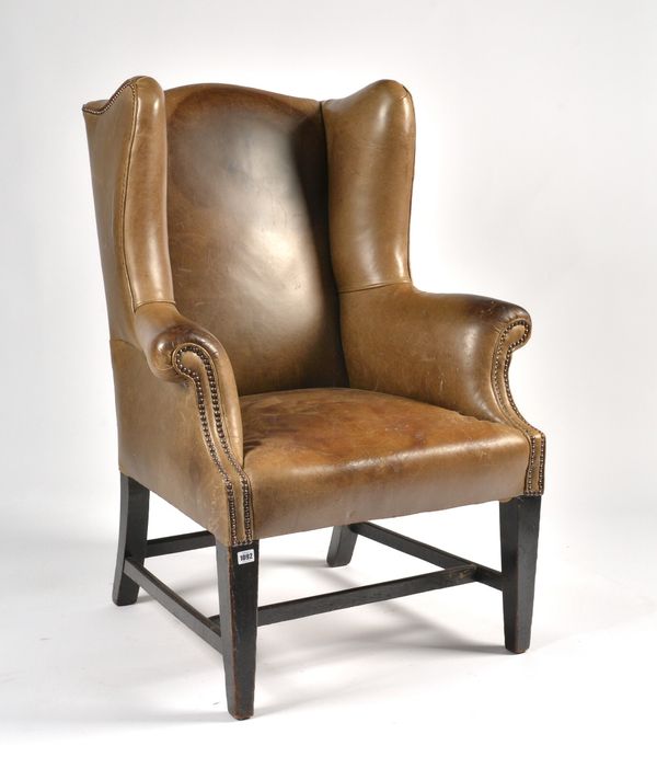 AN 18TH CENTURY STYLE STUDDED LEATHER UPHOLSTERED WINGBACK ARMCHAIR