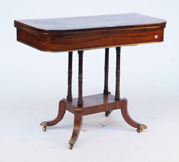 A REGENCY BRASS MOUNTED ROSEWOOD CARD TABLE