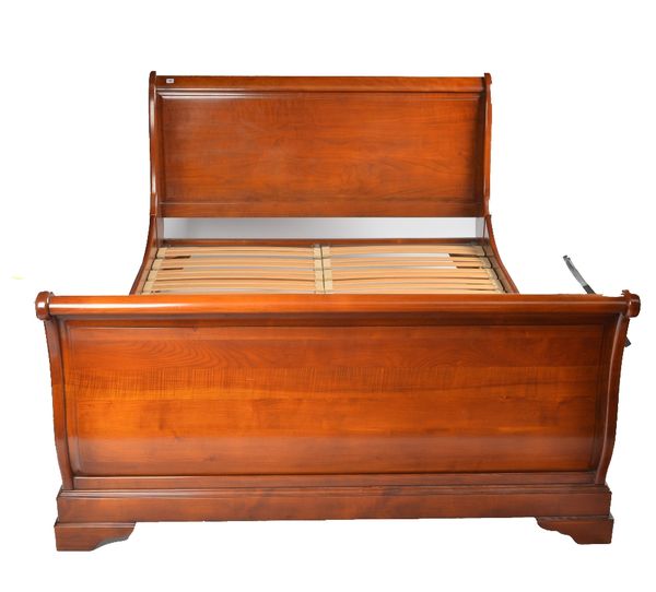 A FRENCH FRUITWOOD SLEIGH BED