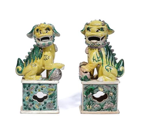 A PAIR OF CHINESE FAMILLE-VERTE BUDDHIST LIONS