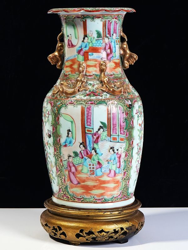 A CANTON FAMILLE-ROSE BALUSTER VASE