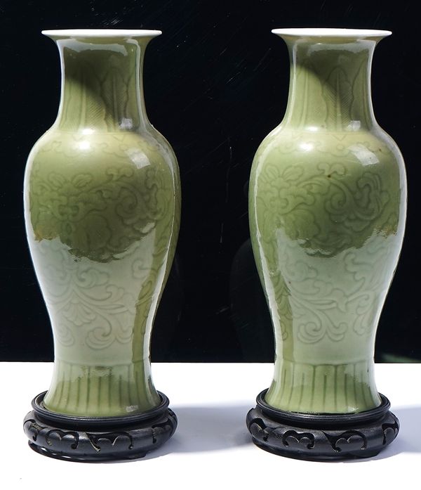 A PAIR OF CHINESE PORCELAIN CELADON GLAZED SLENDER BALUSTER VASES