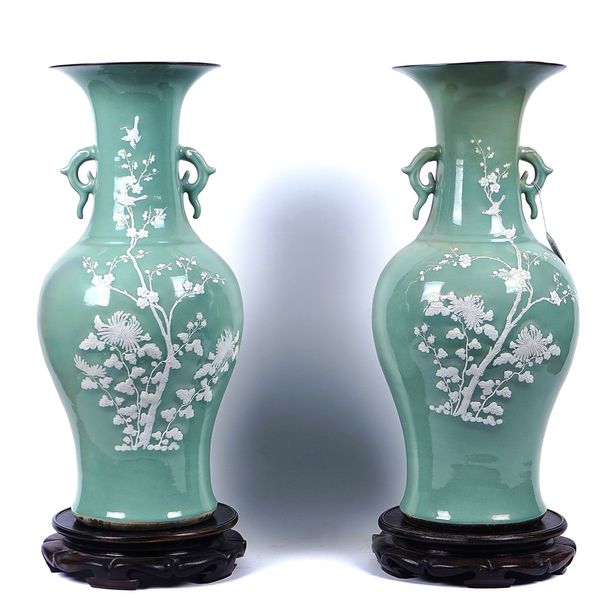 A LARGE PAIR OF CHINESE CELADON-GROUND TWO HANDLED BALUSTER VASES