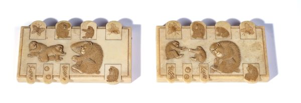 A PAIR OF JAPANESE IVORY BEZIQUE COUNTERS (2)