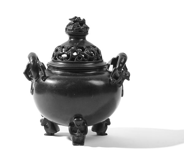 A BRONZE TRIPOD CENSER AND COVER