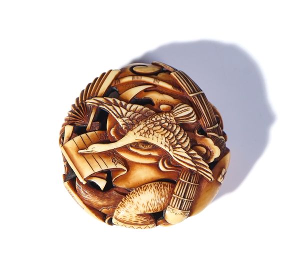 A JAPANESE IVORY RYUSA MANJU NETSUKE