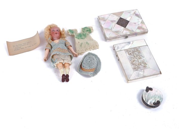 TWO VISITING CARD CASES, A MAGNIFYING GLASS AND A DOLL (4)